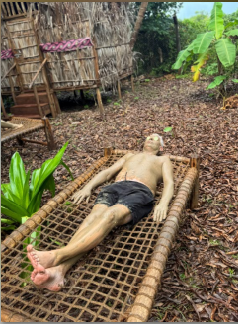 Sun-drying on the woven straw sunbather bed in the garden